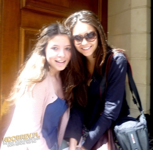 nina-with-a-fan-in-paris-in-front-of-the-hotel-where-she-s-staying-wuth-ian-X-ian-somerhalder-and-nina-dobrev-22265976-500-492.jpg